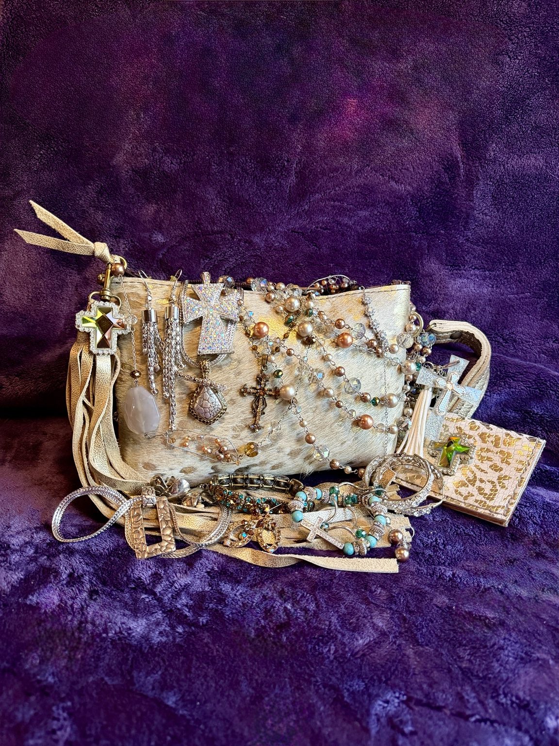 Golden Cross Mystery Collection jewelry and accessories displayed together